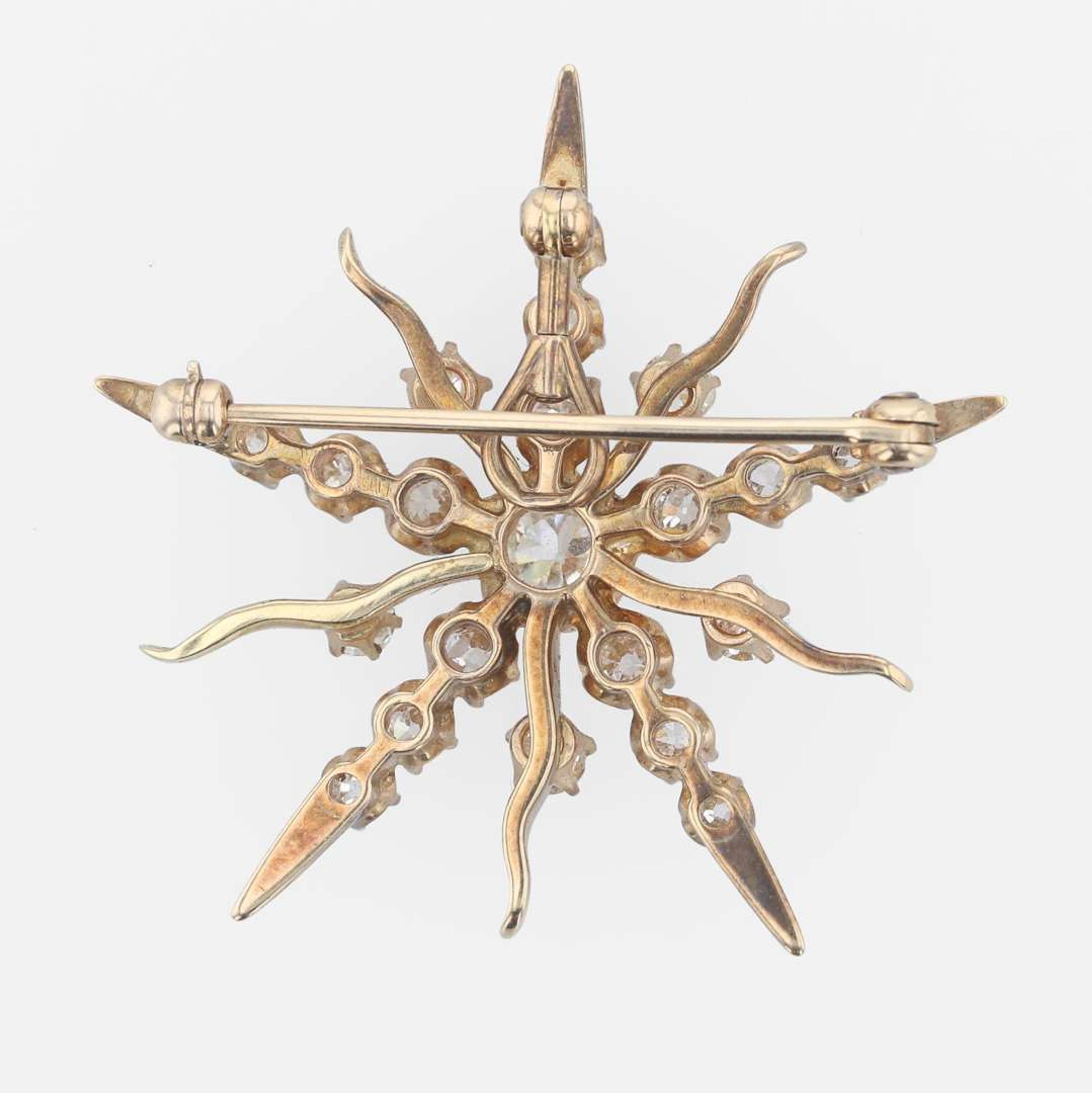A 14K rose gold and diamond pendant/brooch
