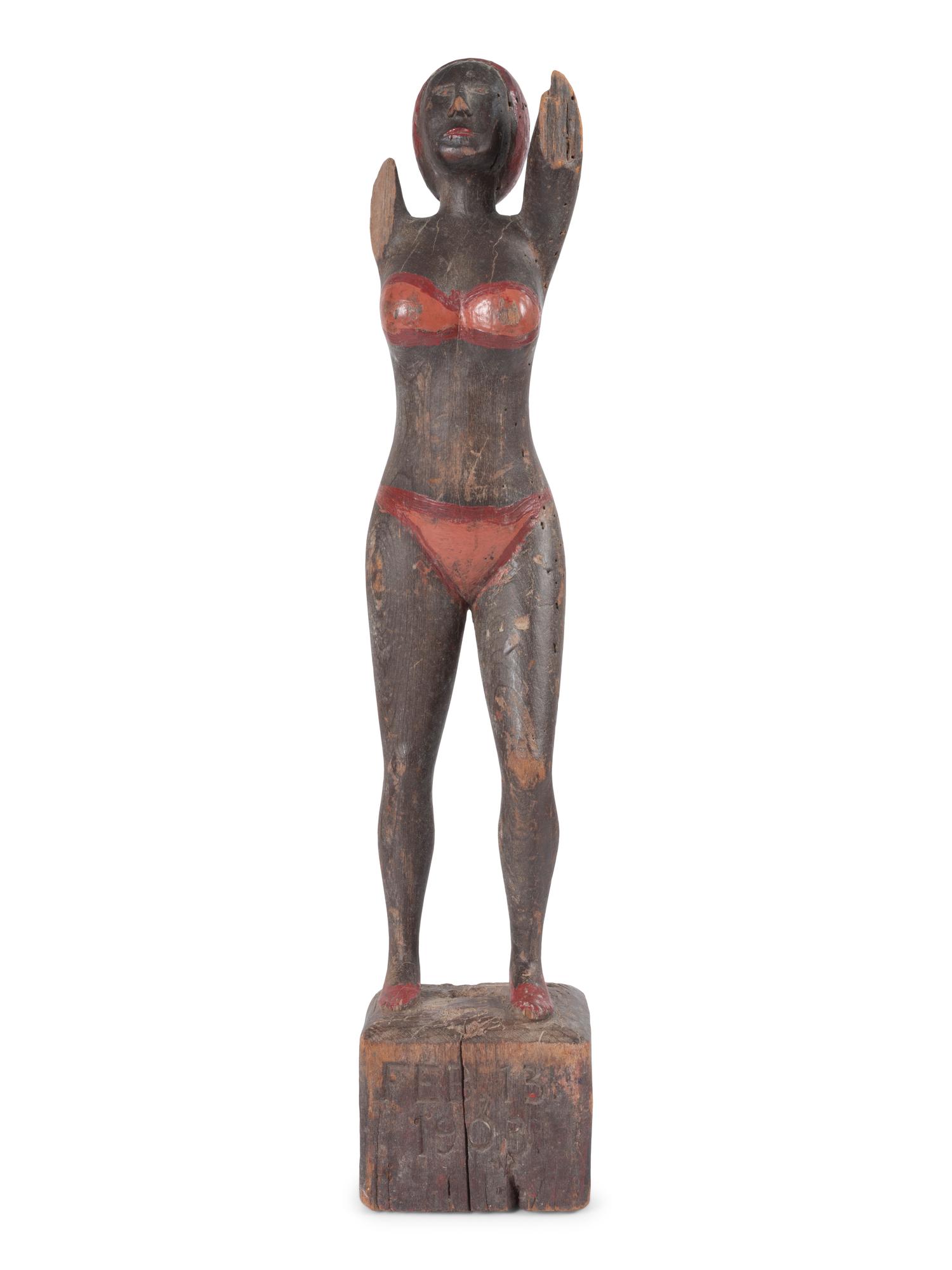 A Carved and Painted Wood Bather Figure