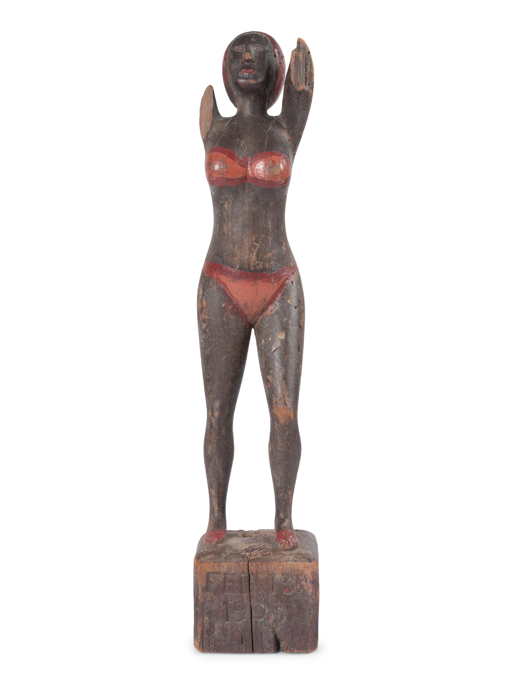 A Carved and Painted Wood Bather Figure