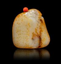 A Chinese Russet and White Jade 'Monkey and Peach' Snuff Bottle