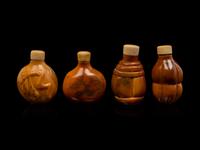 Four Chinese Carved Horn Snuff Bottles