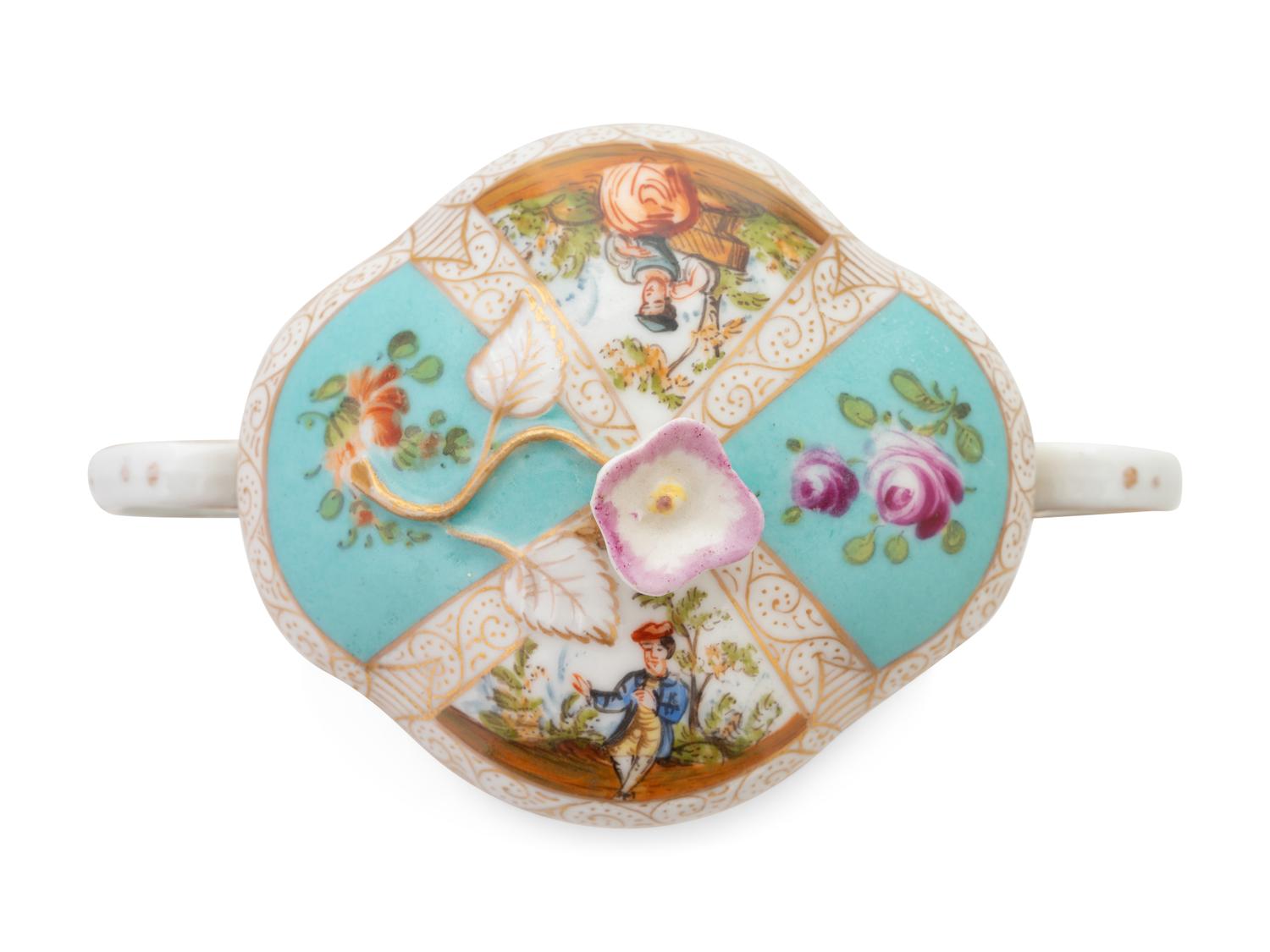 A German Porcelain Covered Cup and Saucer