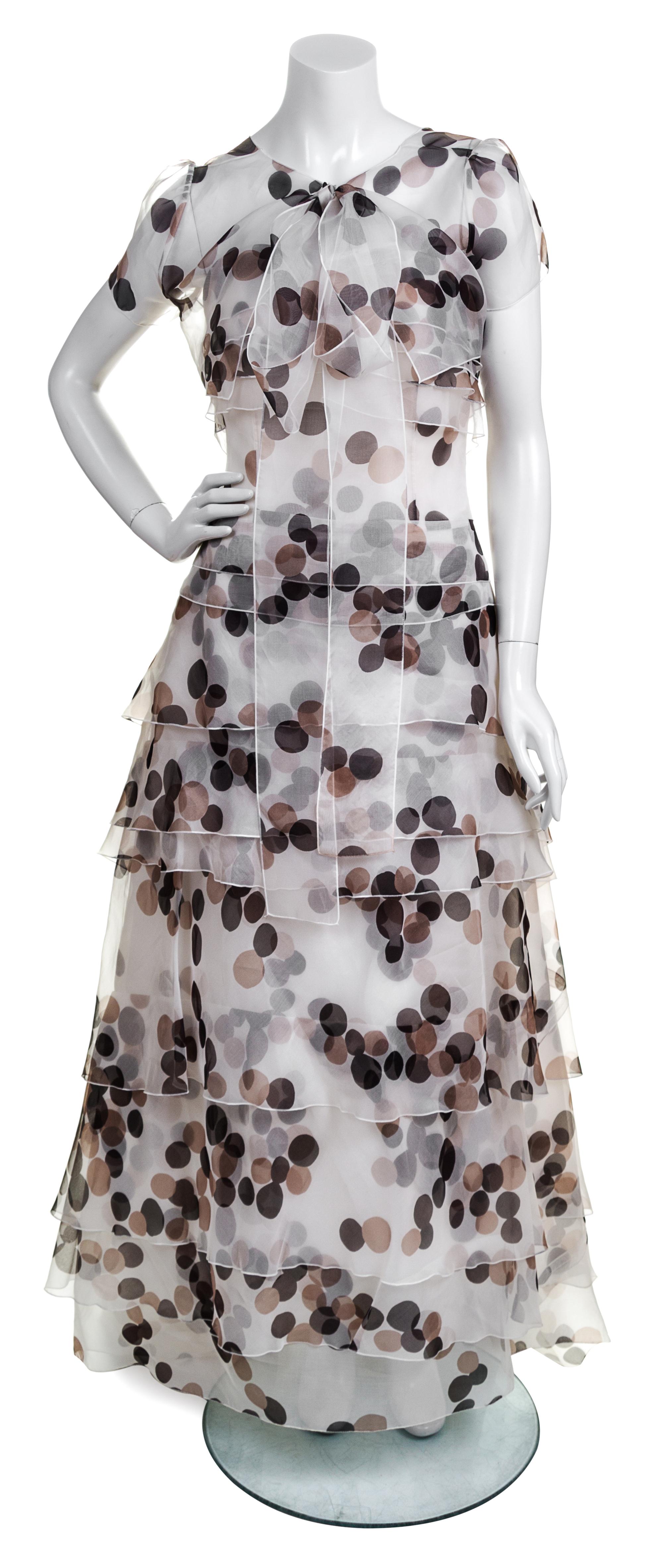 A Carolina Herrera Cream Silk Polka Dot Strapless Gown, Size: 8.