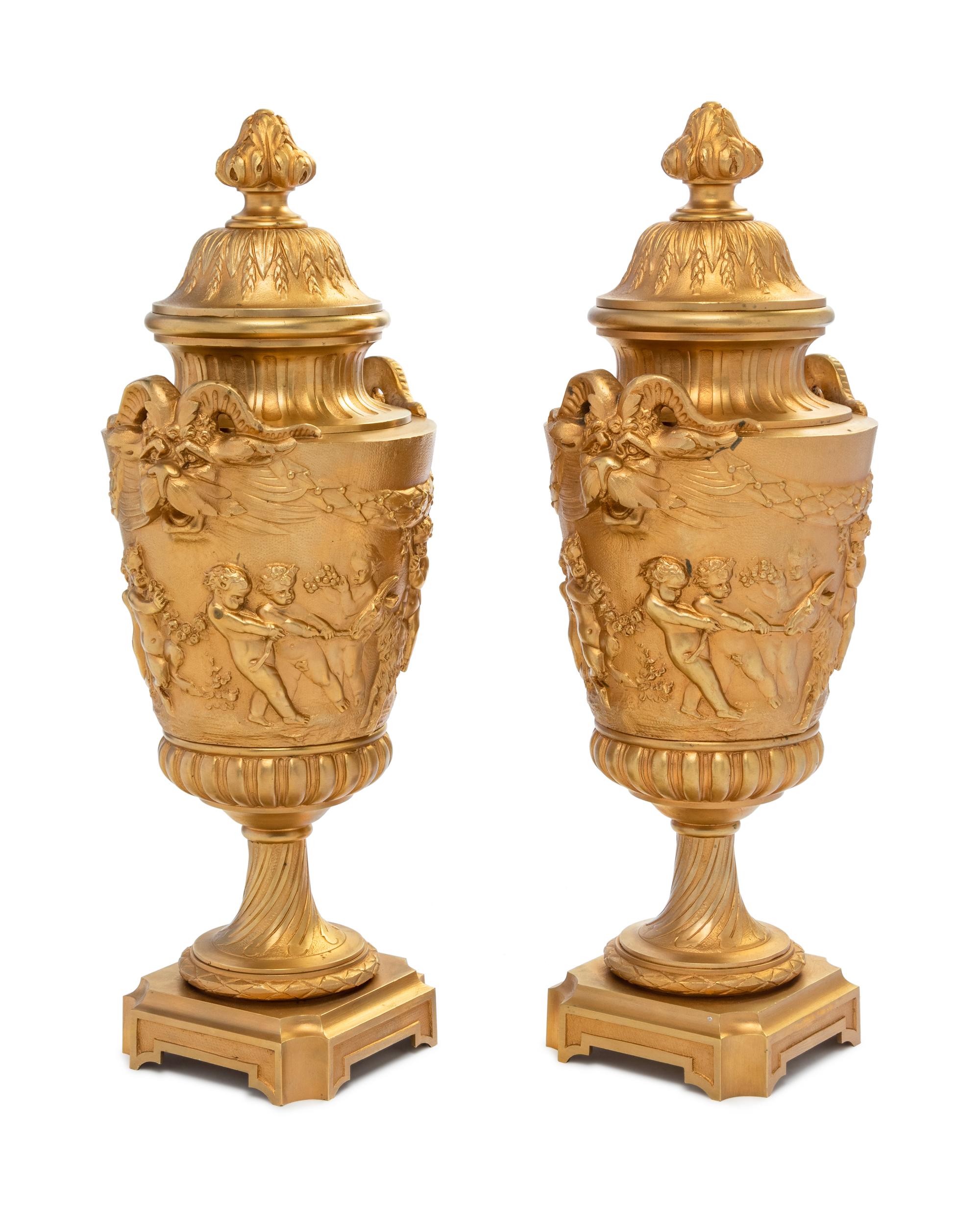 A Pair of Continental Gilt Bronze Covered Urns