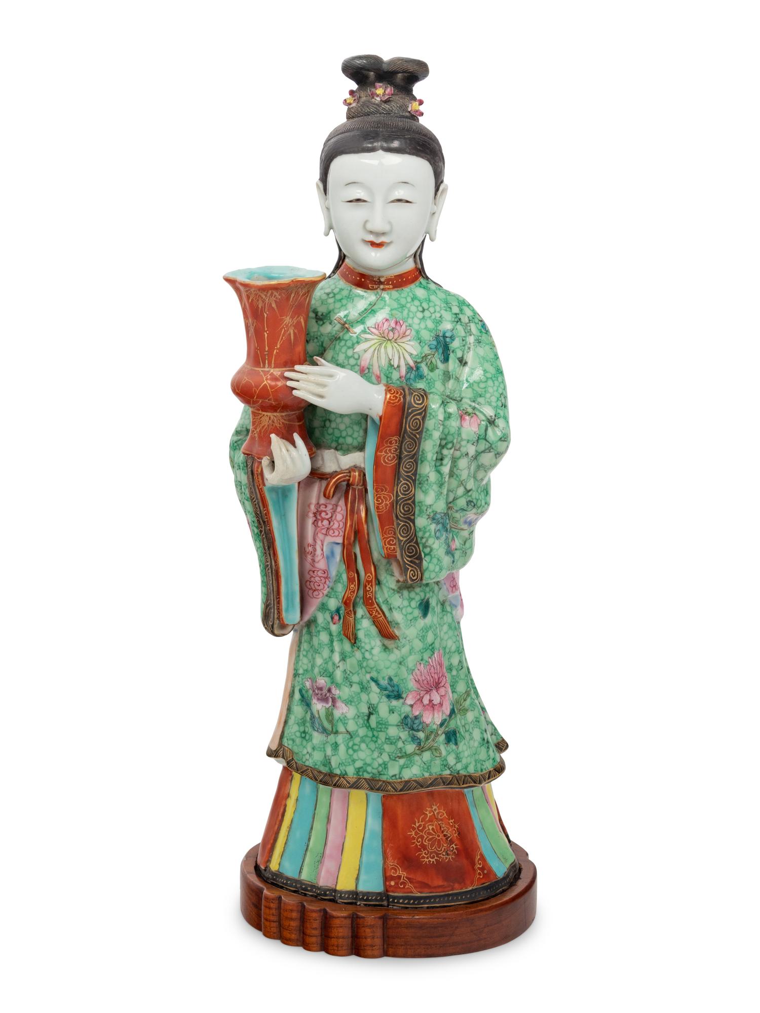A Chinese Export Figure of a Standing Court Maiden
