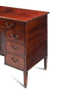 An English Mahogany Kneehole Desk