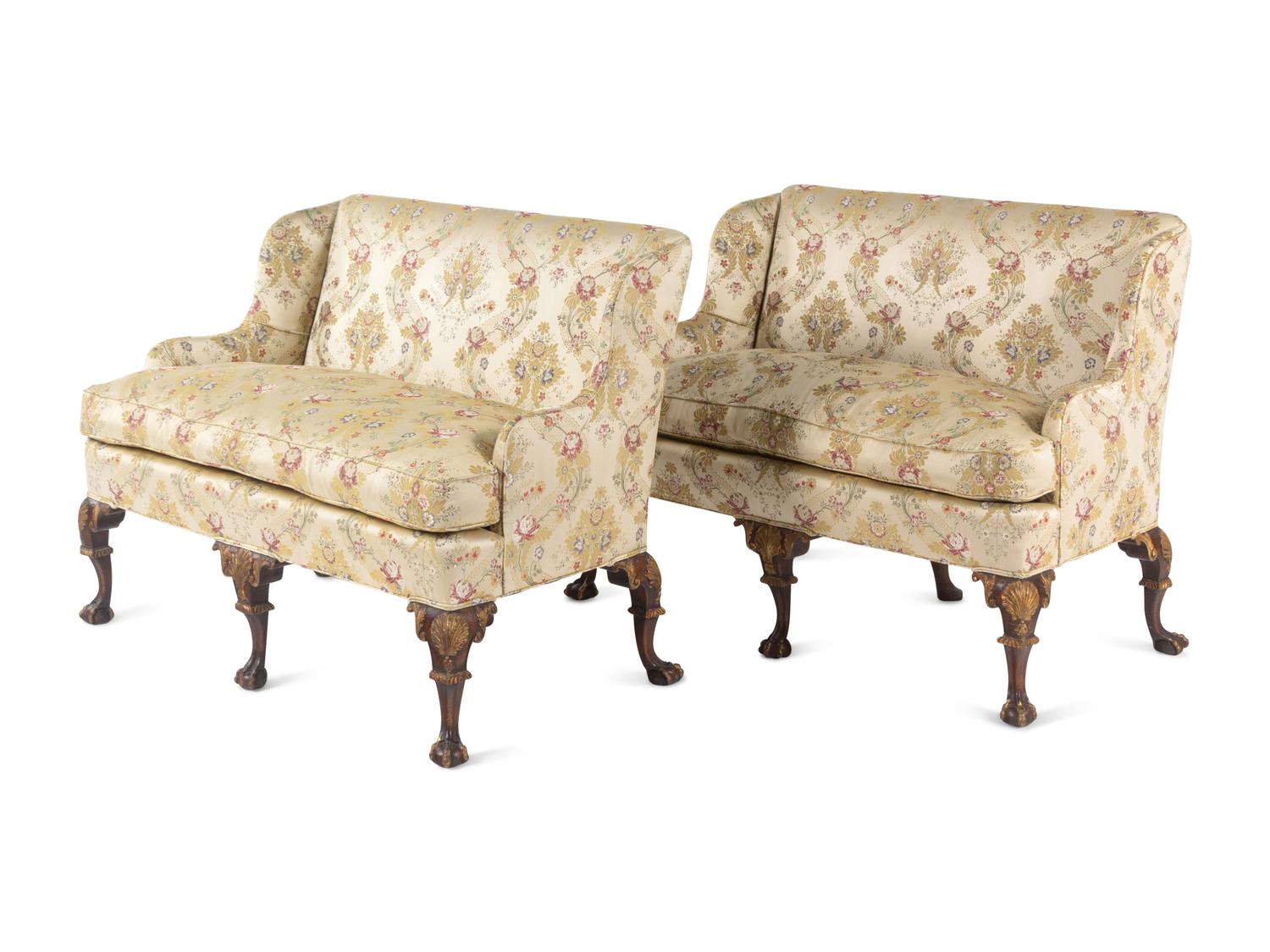 A Pair of George II Style Parcel-Gilt Walnut Settees