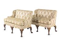 A Pair of George II Style Parcel-Gilt Walnut Settees