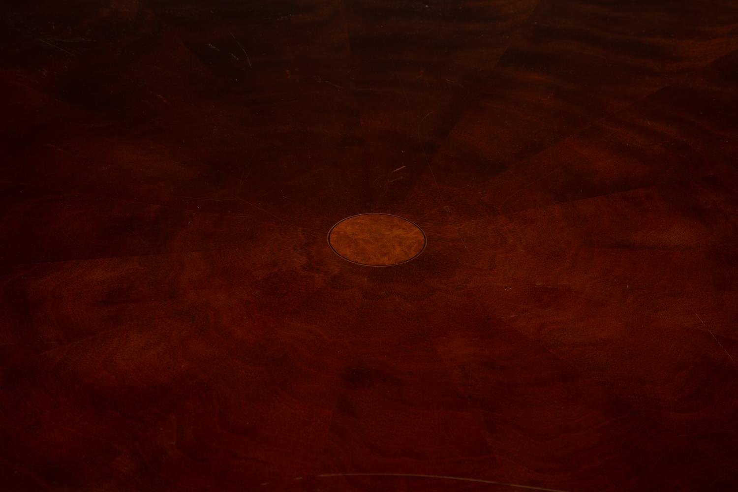 A Regency Style Mahogany Extending Circular Dining Table