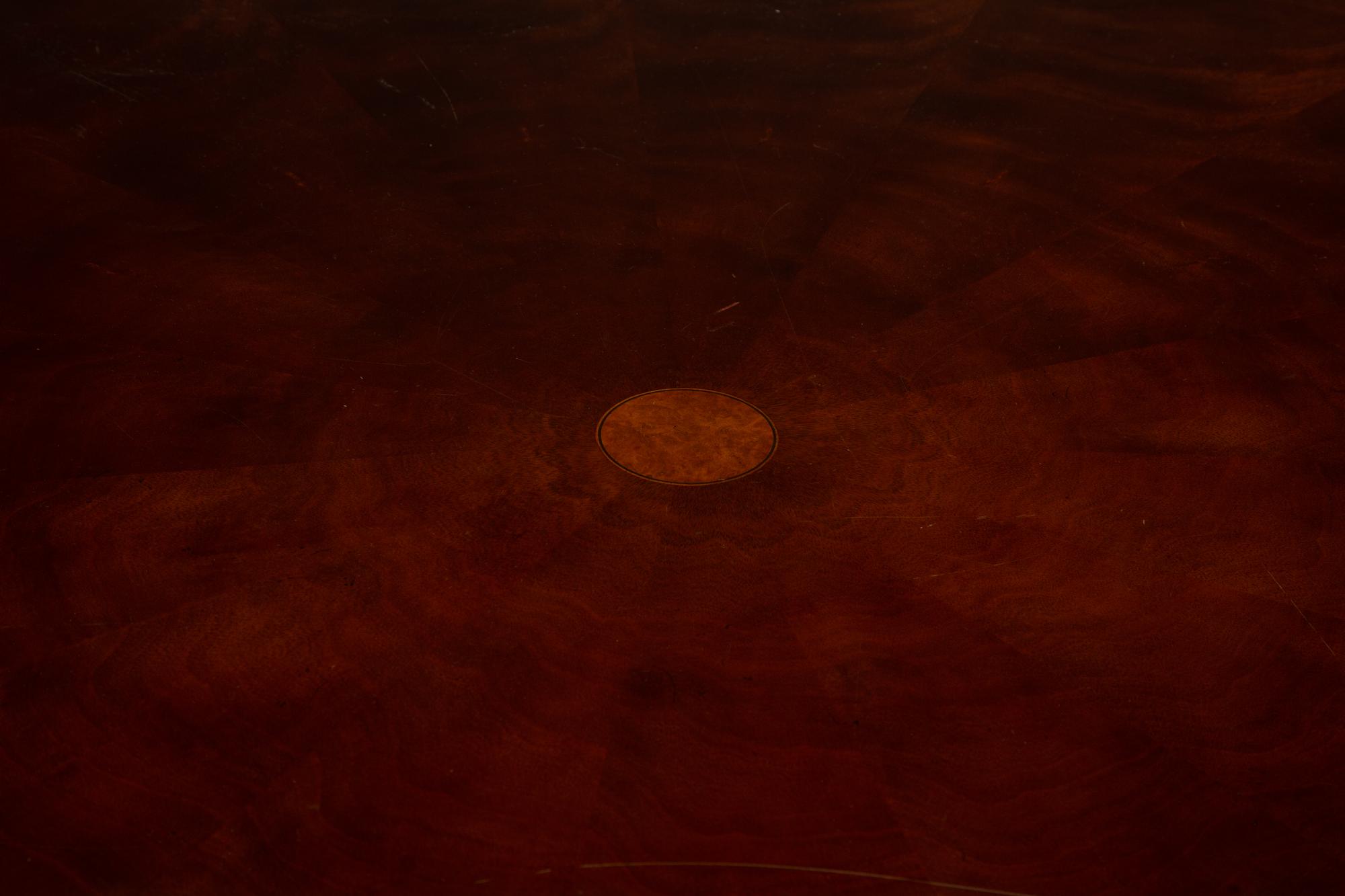 A Regency Style Mahogany Extending Circular Dining Table