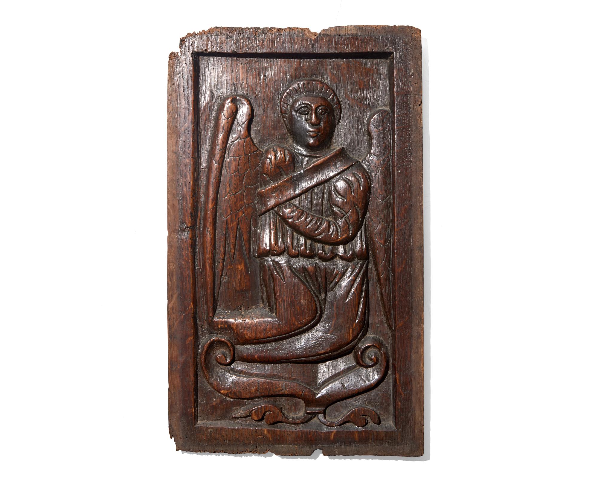 A Group of Seven English and Continental Renaissance / Baroque Carved Oak and Walnut Architectural Fragments