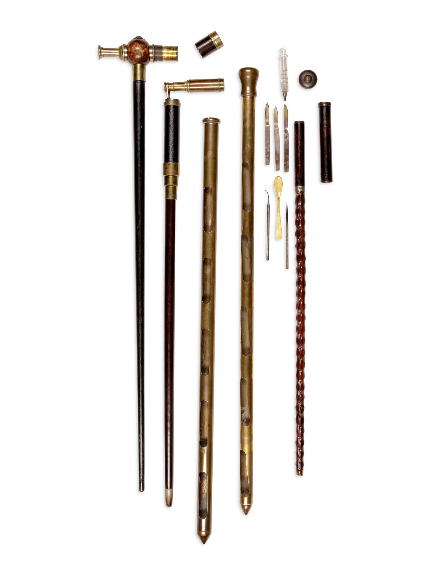 Four English Brass Mounted Explorer's Walking Sticks
