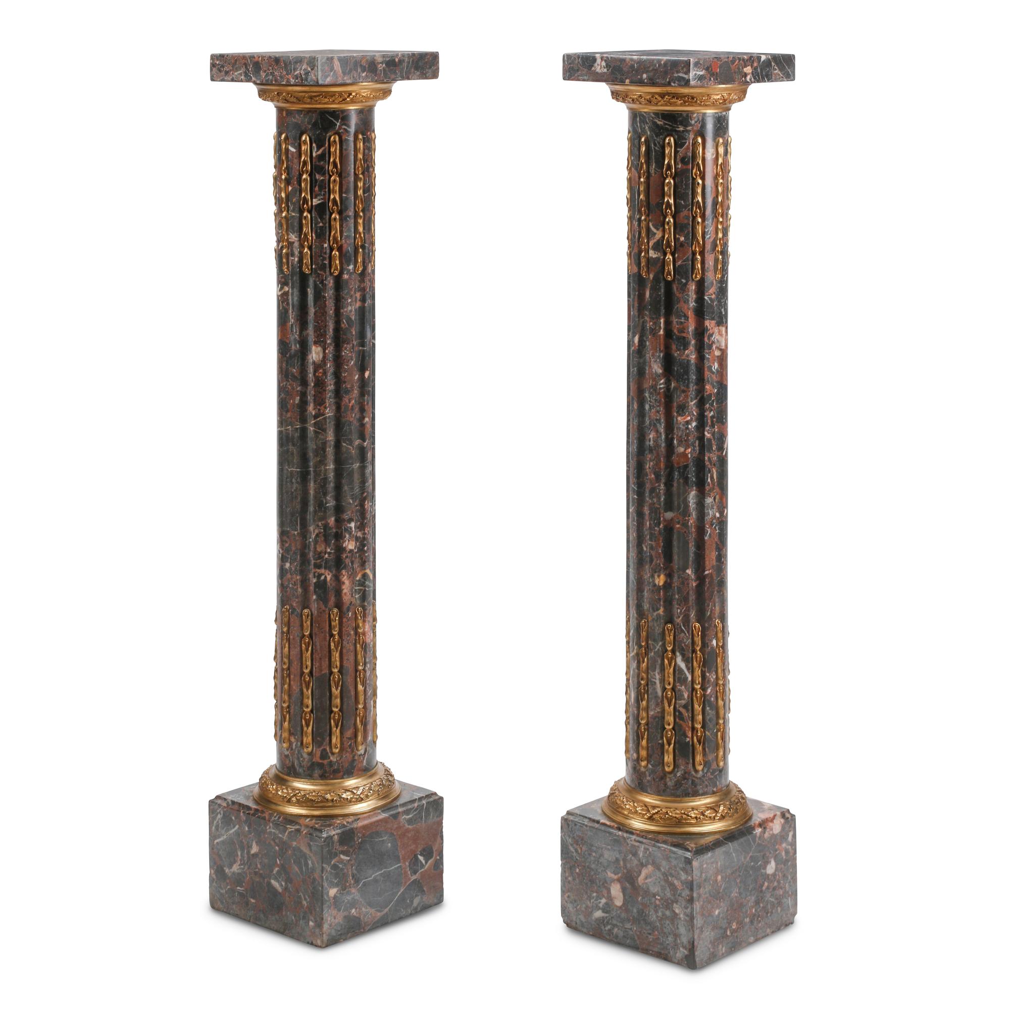 A Pair of Louis XVI Style Gilt Bronze Mounted Marble Pedestals