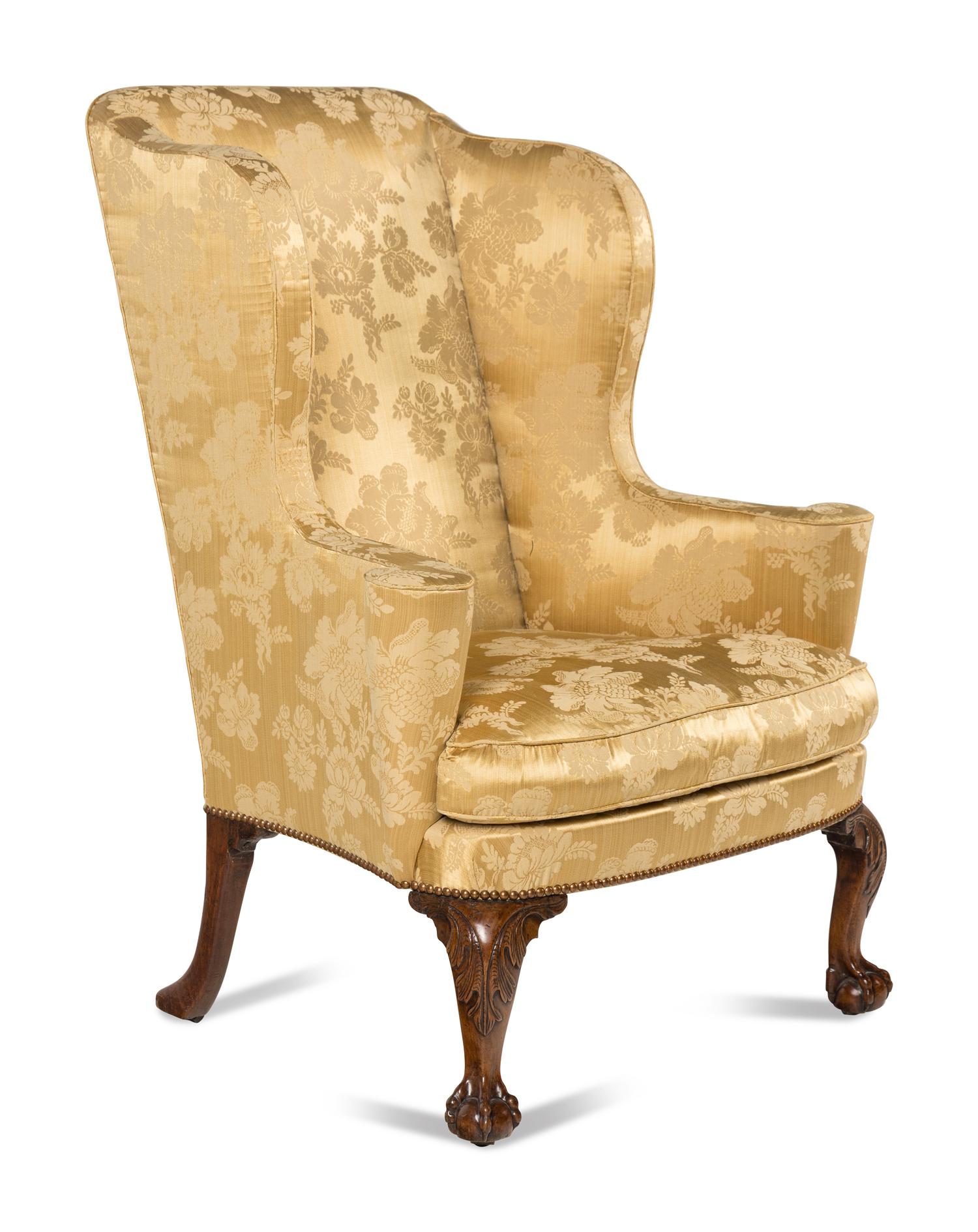 A George II Walnut Wingback Armchair