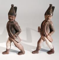 A Pair of Partially Painted Iron Andirons Height 21 inches.