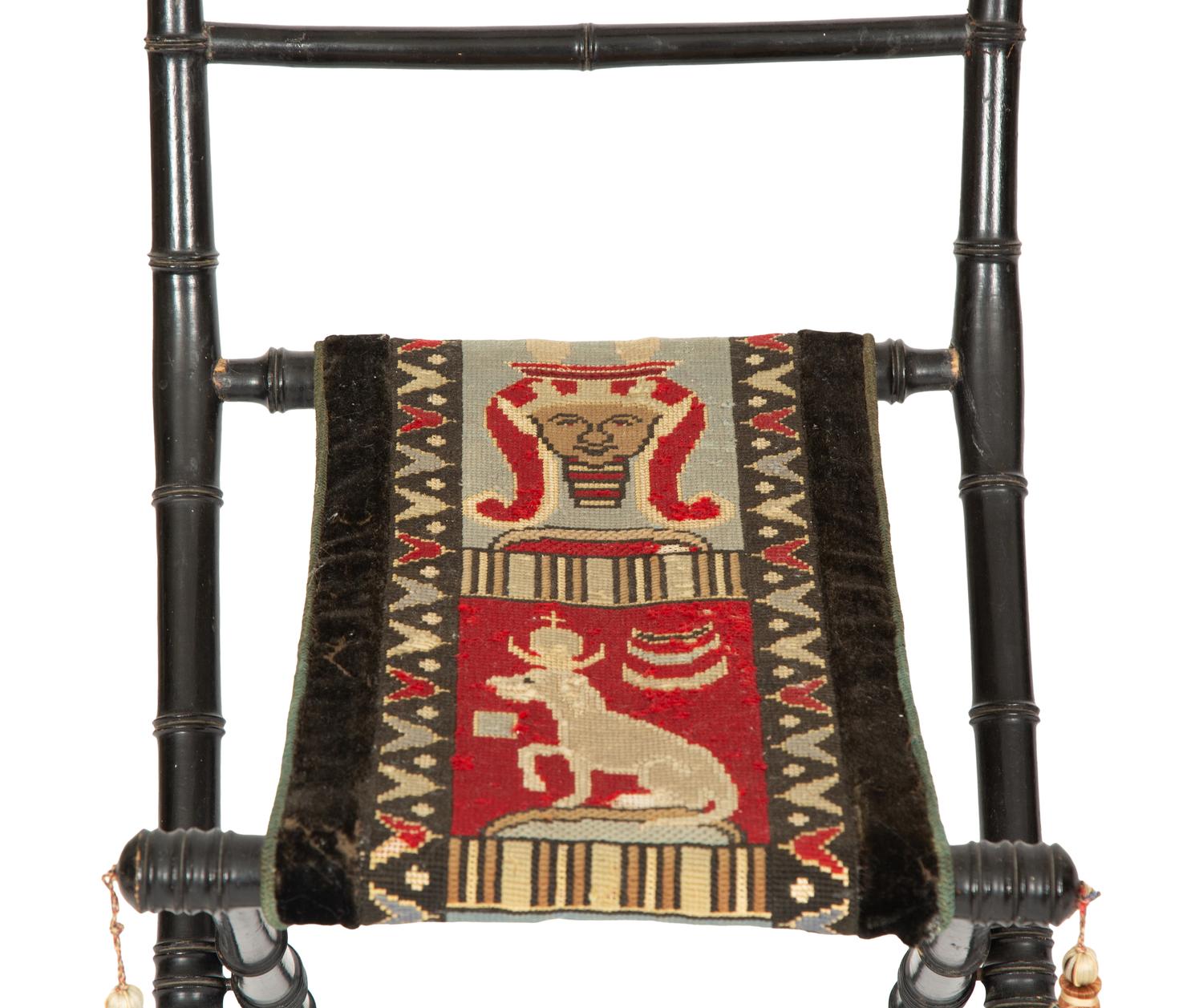 A Pair of Napoleon III Ebonized Folding Chairs with Needlepoint Seats