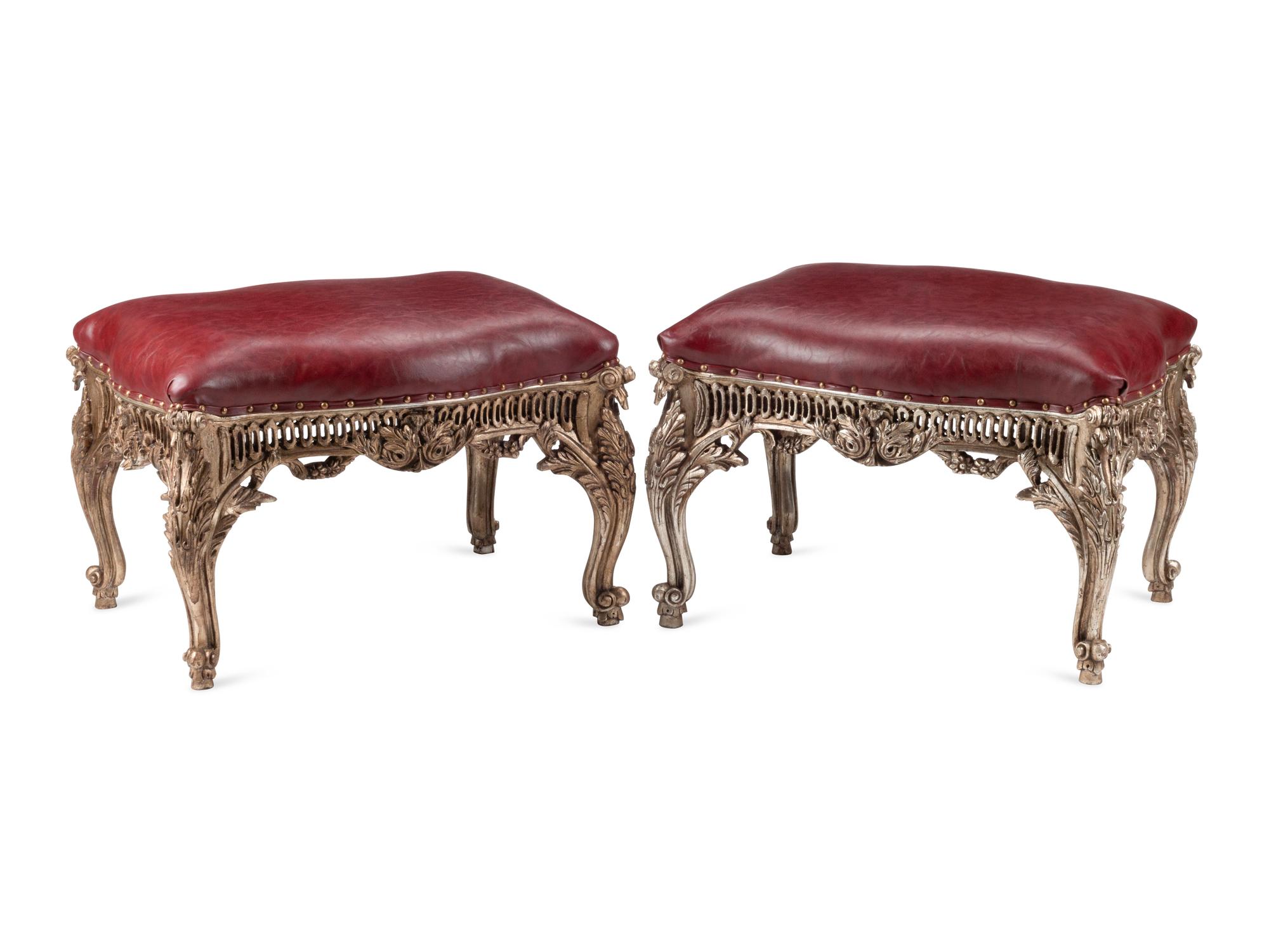 A Pair of Régence Style Silvered Benches with Leather Upholstery