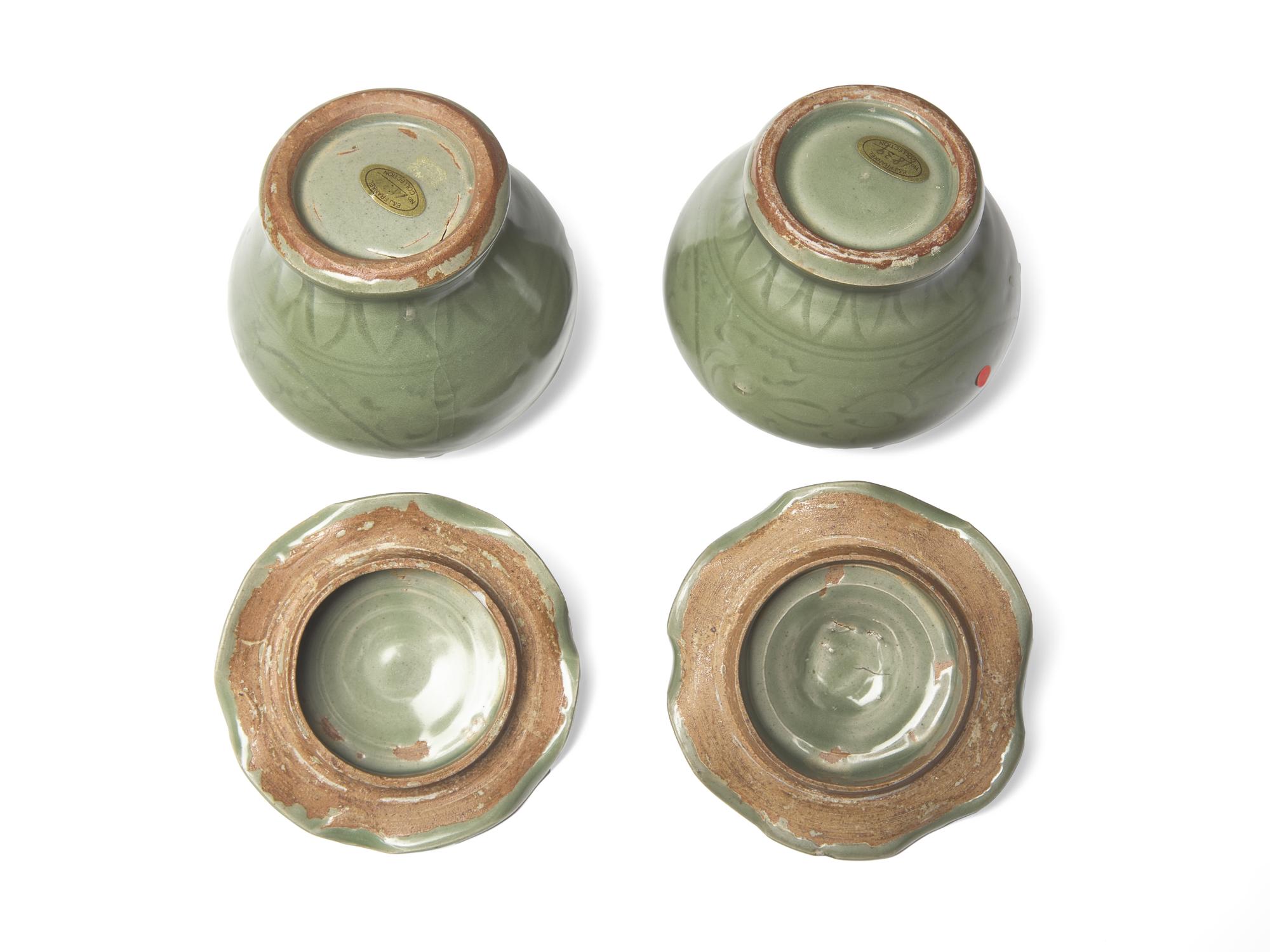 A Pair of Small Chinese Celadon Covered “Lotus” Jars