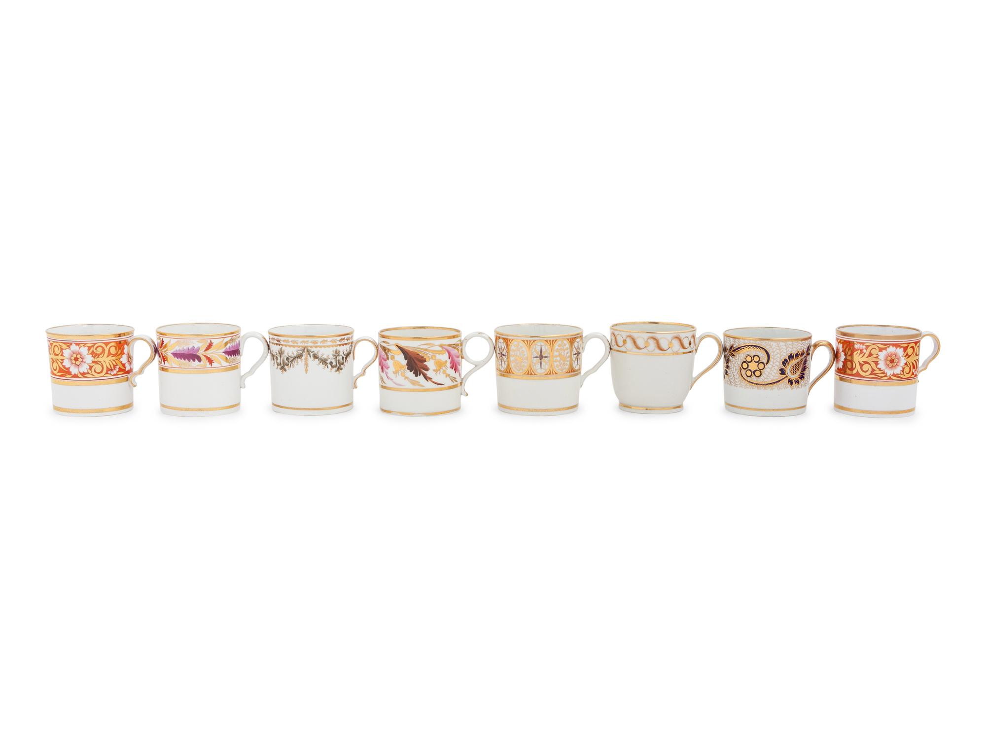 A Group of Eight English Porcelain Coffee Canns