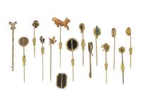 COLLECTION OF STICKPINS AND A BROOCH