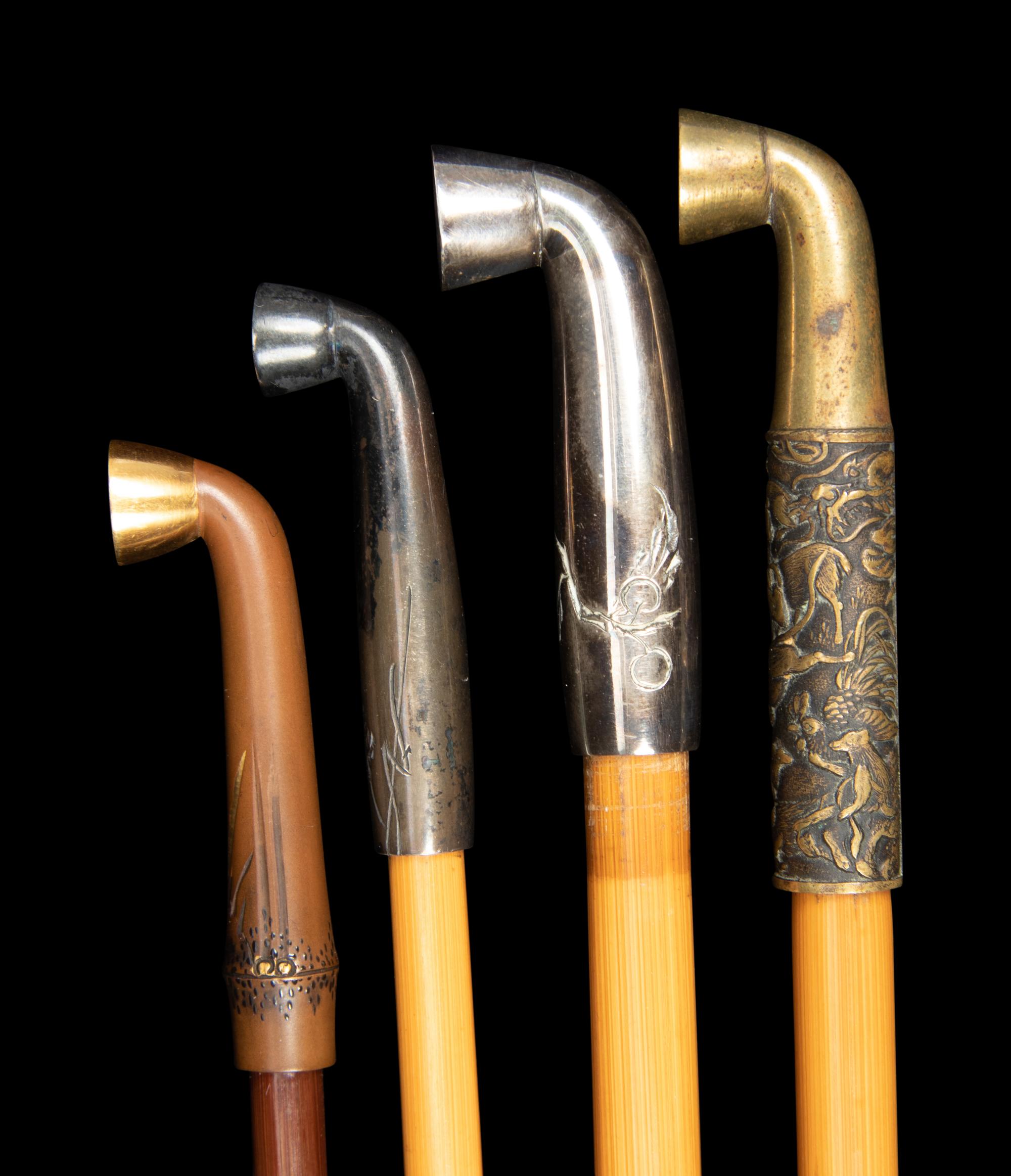 Five Chinese and Japanese Metal Mounted Bamboo Smoking Pipes