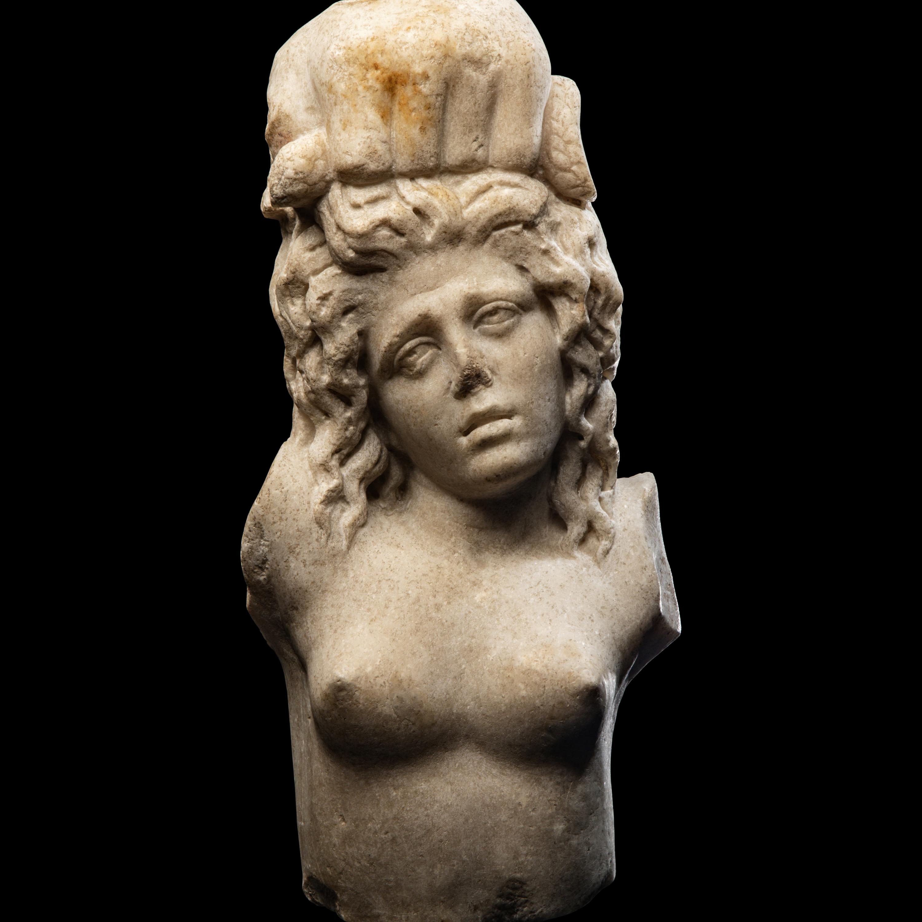 A Roman Marble Fragment with a Female Figure