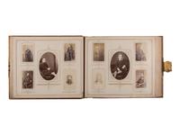[EARLY PHOTO] English album presented to Capt. Bradley cont. 140+ photos, incl. military subjects.
