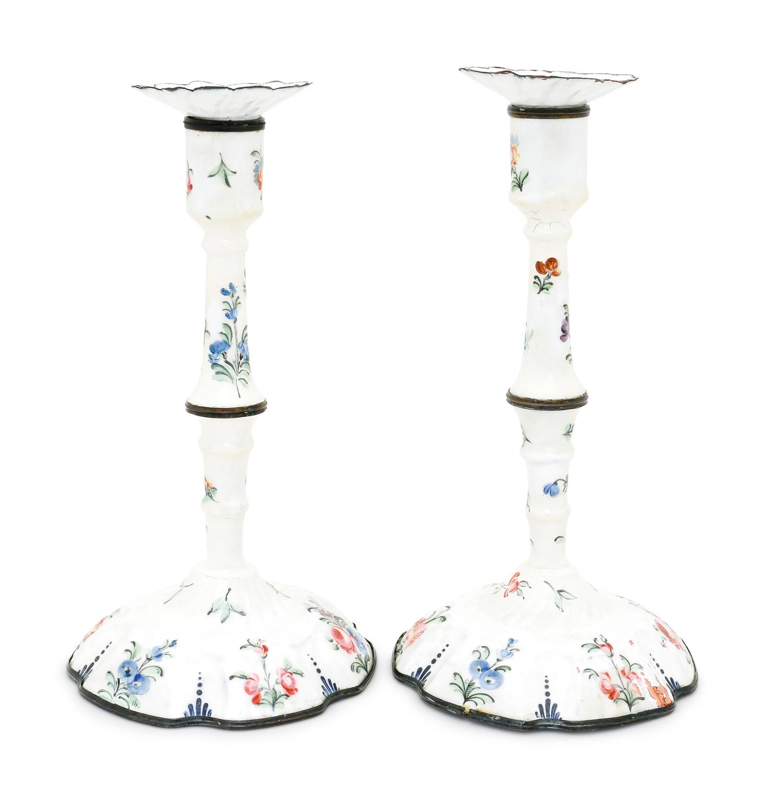 A Pair of Battersea Enamel Candlesticks