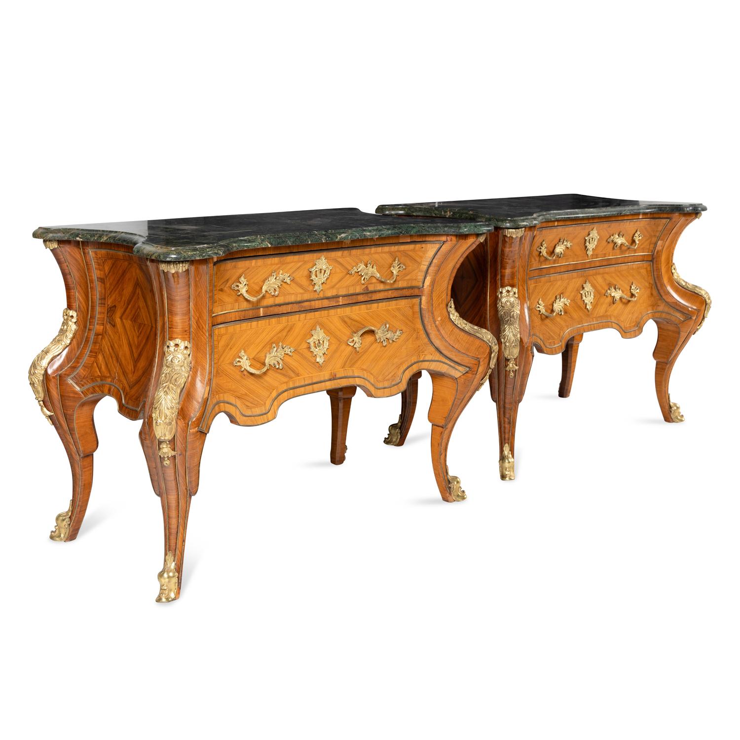 A Pair of Régence Style Gilt Bronze Mounted Tulipwood Marble-Top Commodes
