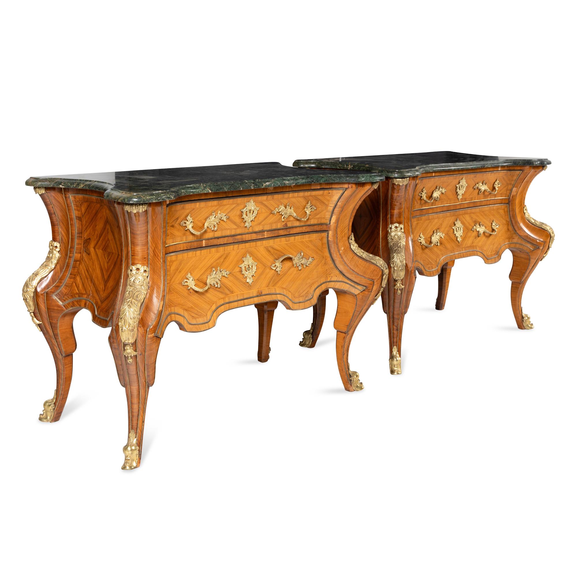 A Pair of Régence Style Gilt Bronze Mounted Tulipwood Marble-Top Commodes