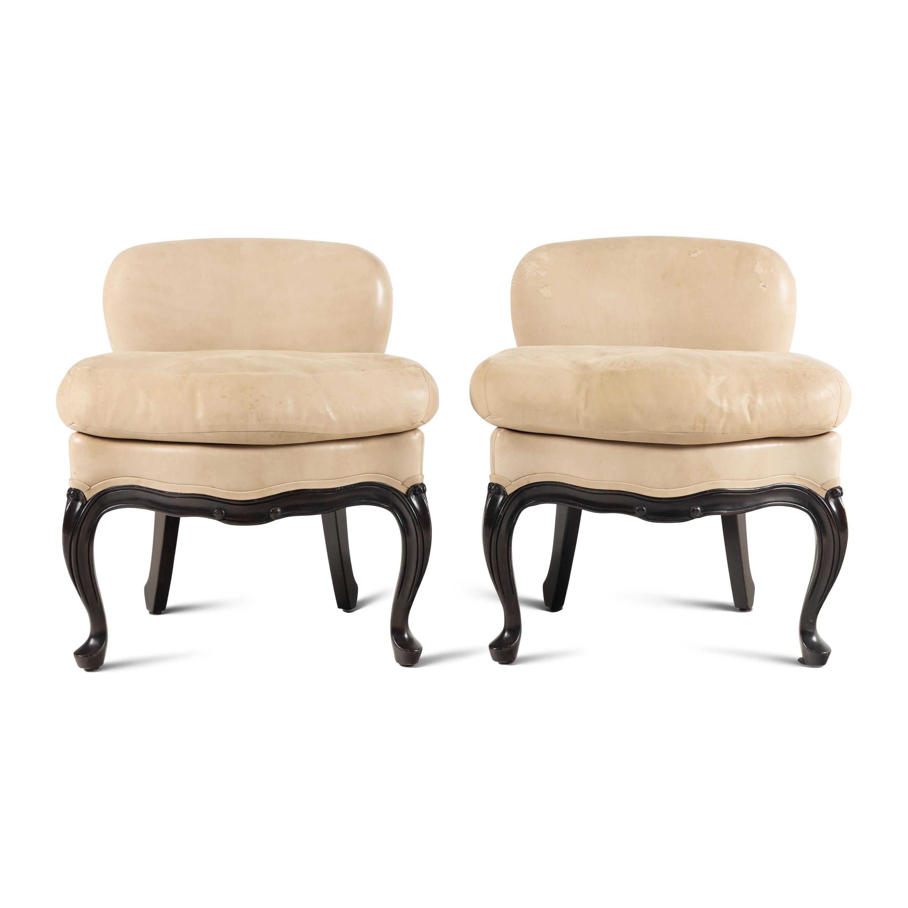 A Pair of Michael Taylor Leather Upholstered Slipper Chairs