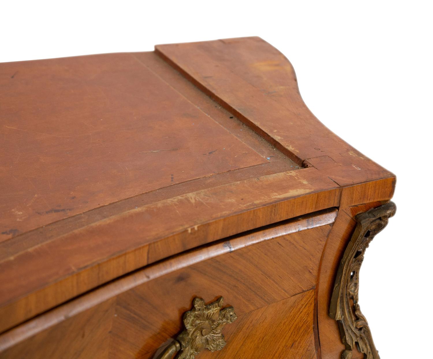 A Pair of Gilt Bronze Mounted Kingwood Bombe Commodes