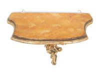 An Italian Rococo Style Carved and Painted Wall Bracket with Faux Marble Shelf