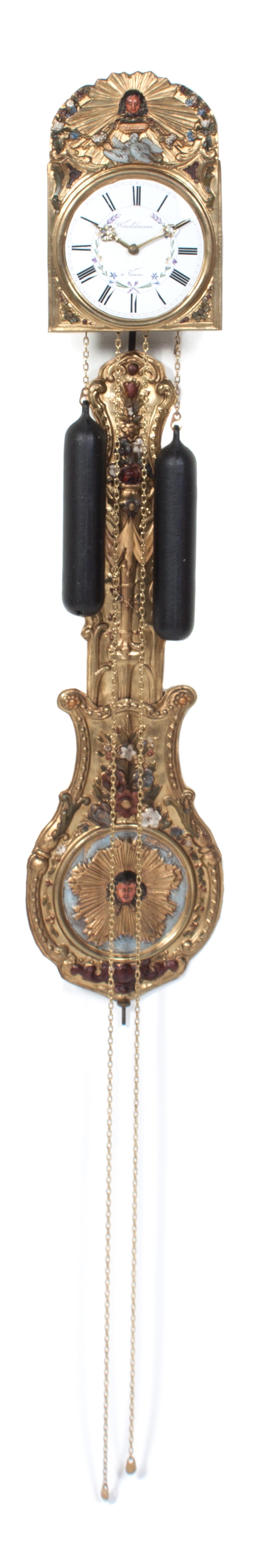 A French Brass Wag-on-the-Wall Clock Height overall 39 inches.