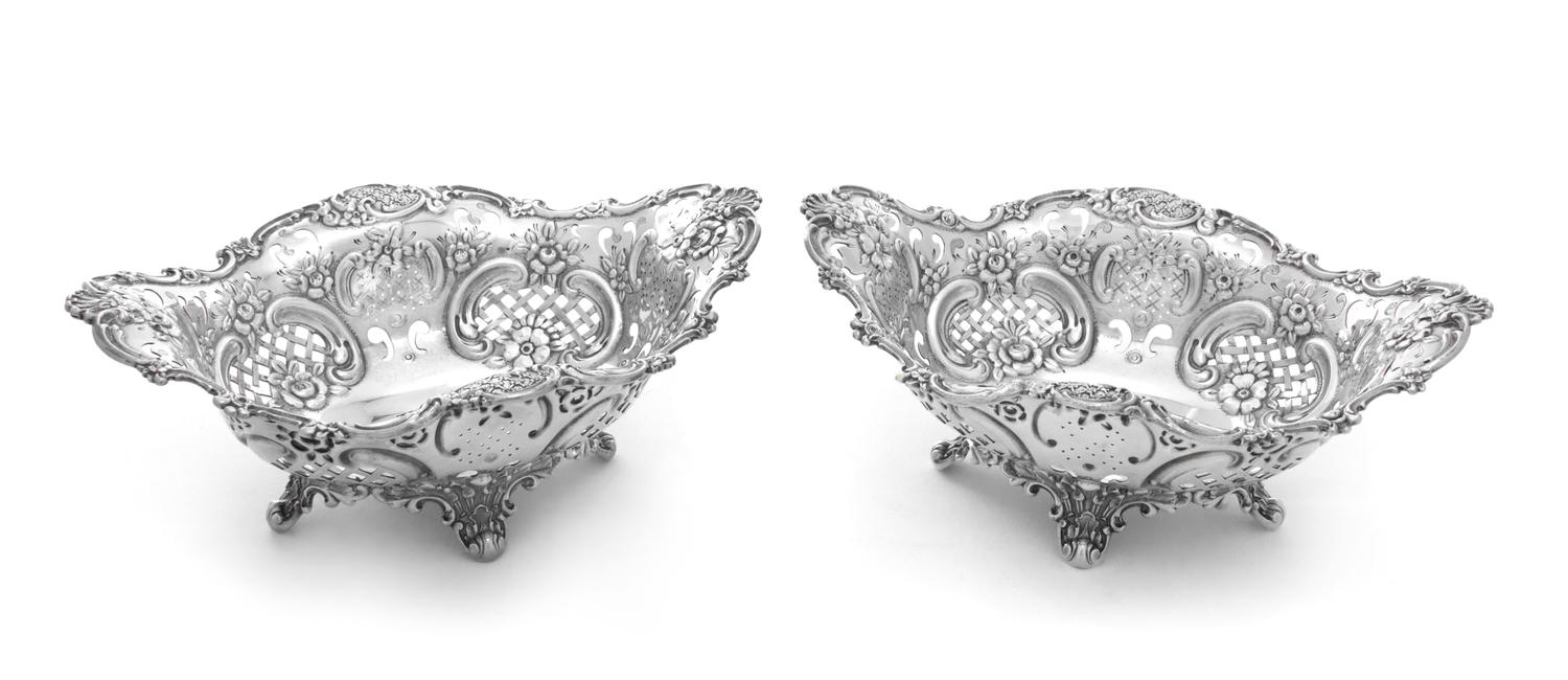 A Pair of American Silver Serving Bowls, Tiffany & Co., New York, NY, of oval form, having pierced sides with applied foliate scroll an