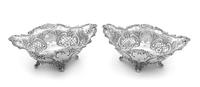 A Pair of American Silver Serving Bowls, Tiffany & Co., New York, NY, of oval form, having pierced sides with applied foliate scroll an