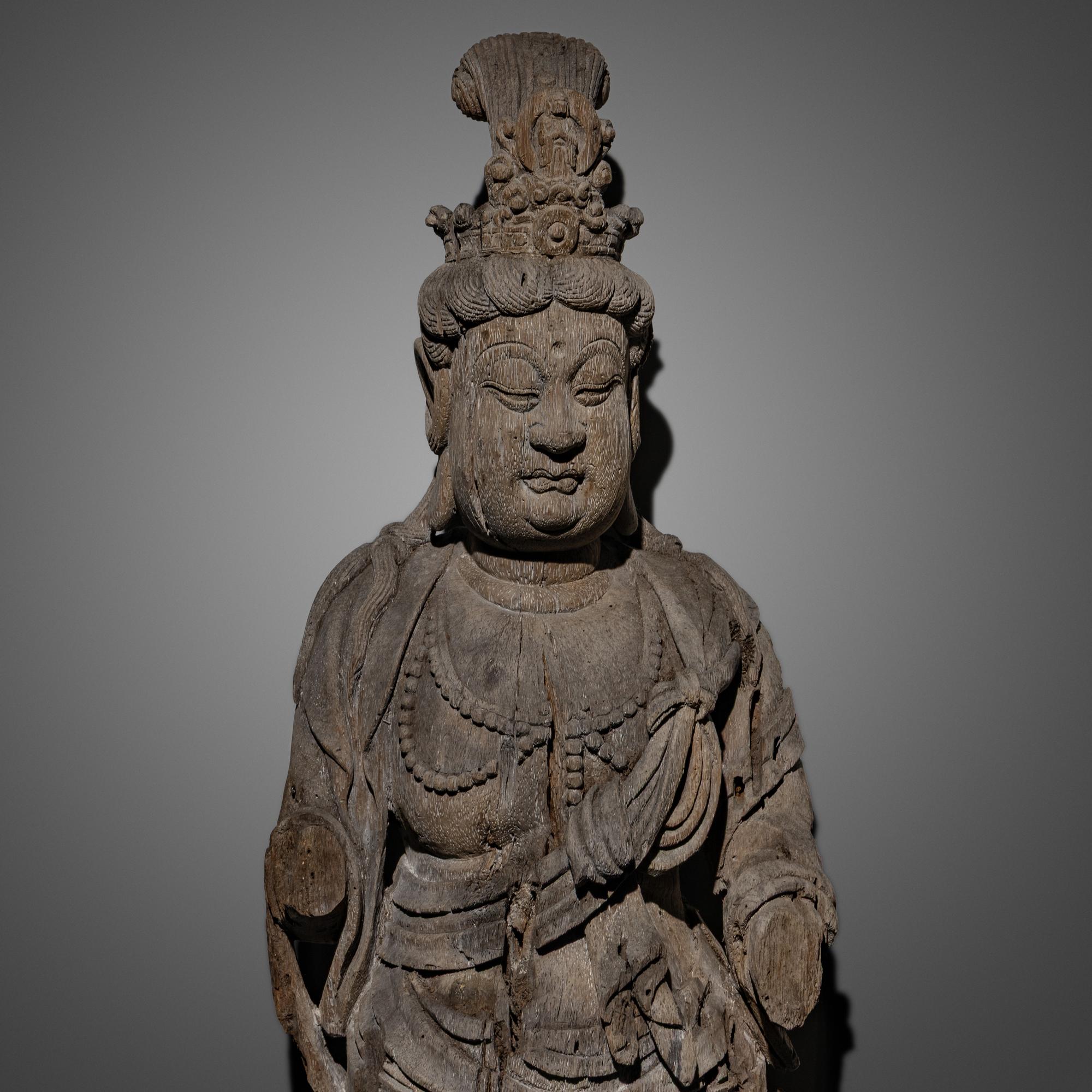 A Chinese Wood Carving of Guanyin Bodhisattva, Yuan Dynasty or Later — 元或以後 木雕觀音像