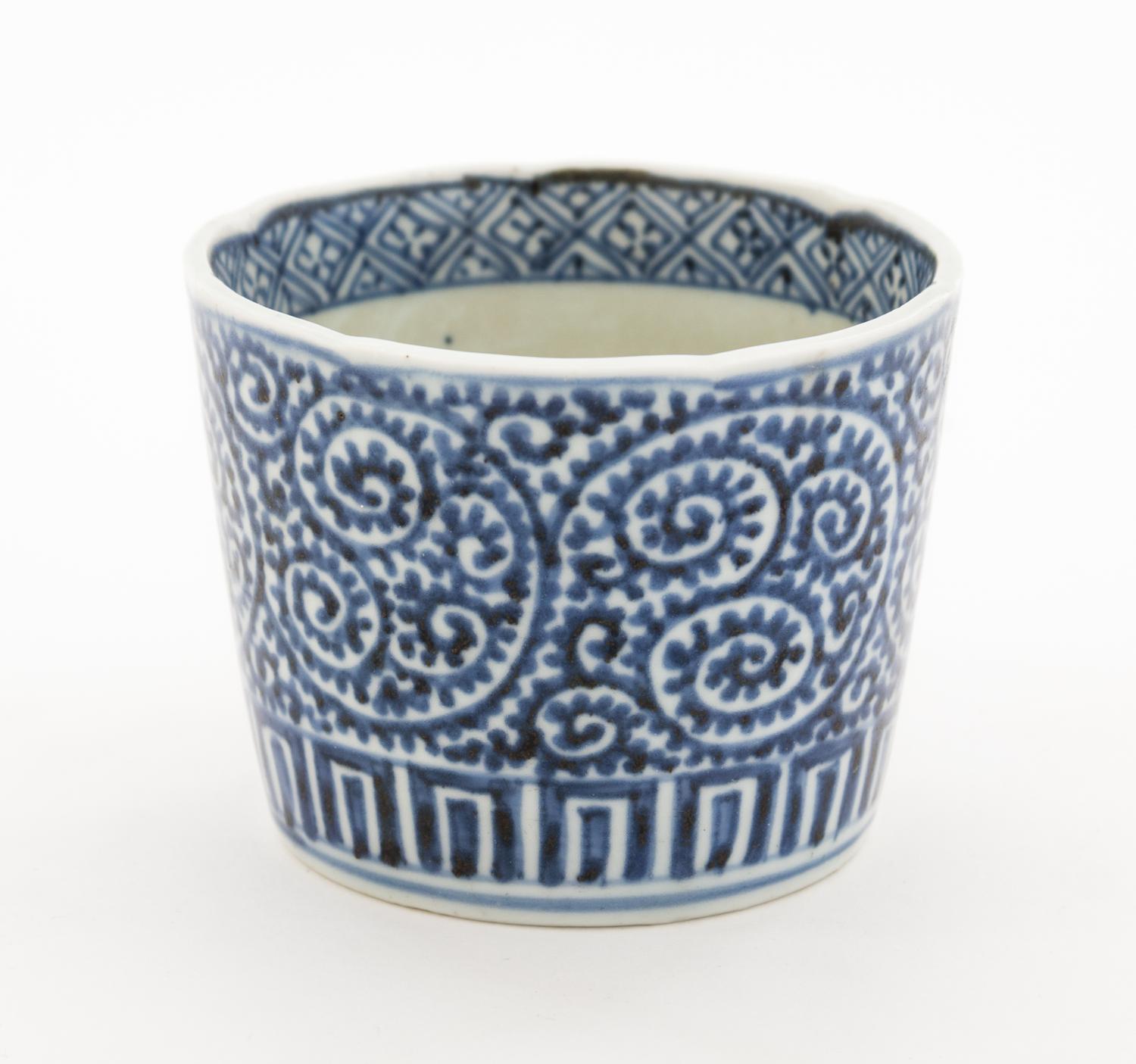 A Chinese Blue and White Porcelain Cup Width 2 5/8 inches.