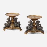 A pair of French Napoleon III patinated and gilt bronze tazza with fauns Bearing marks for Henri Picard (French, active 1831-1864), late 19th century