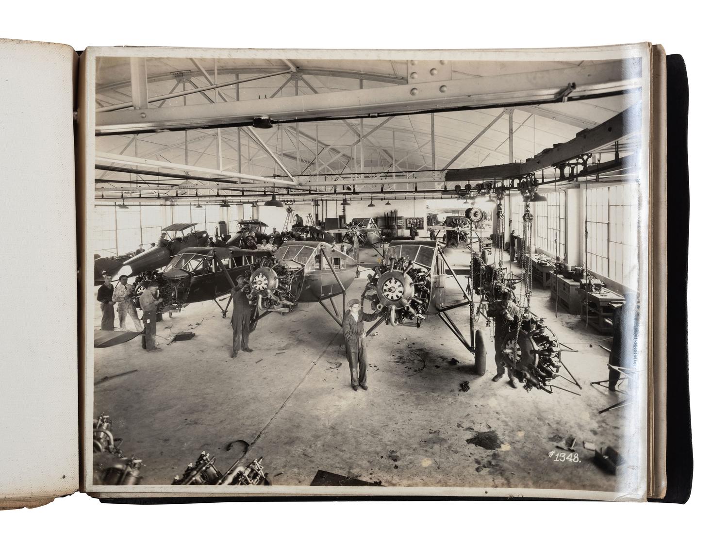 [AVIATION]. SMITH, Edgar B. (1896-1966), photographer. Rare photographic salesman aviation album documenting various airplanes and their construction at the plant of the Travel Air Manufacturing Company of Wichita, Kansas. Ca 1929.