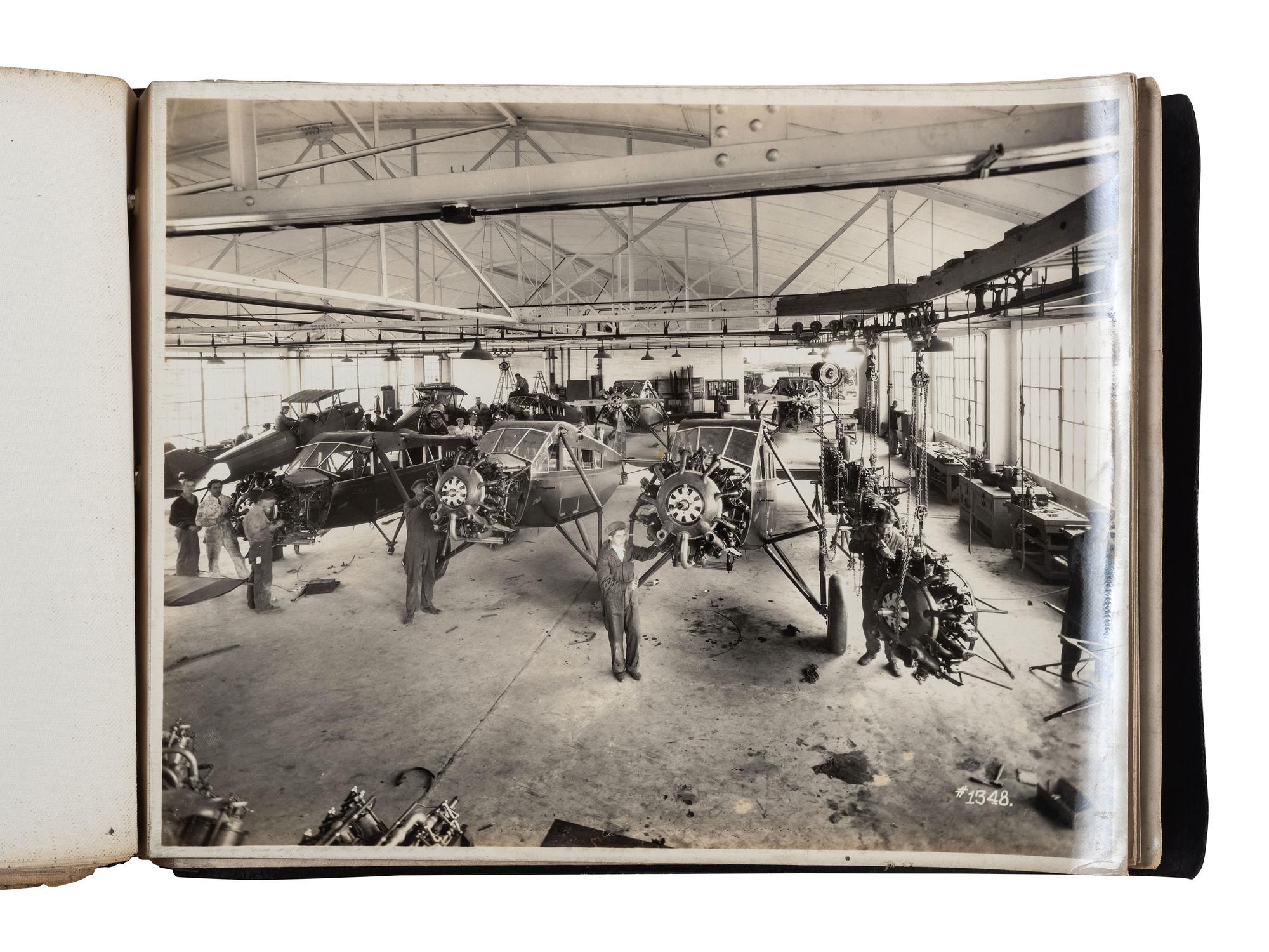 [AVIATION]. SMITH, Edgar B. (1896-1966), photographer. Rare photographic salesman aviation album documenting various airplanes and their construction at the plant of the Travel Air Manufacturing Company of Wichita, Kansas. Ca 1929.