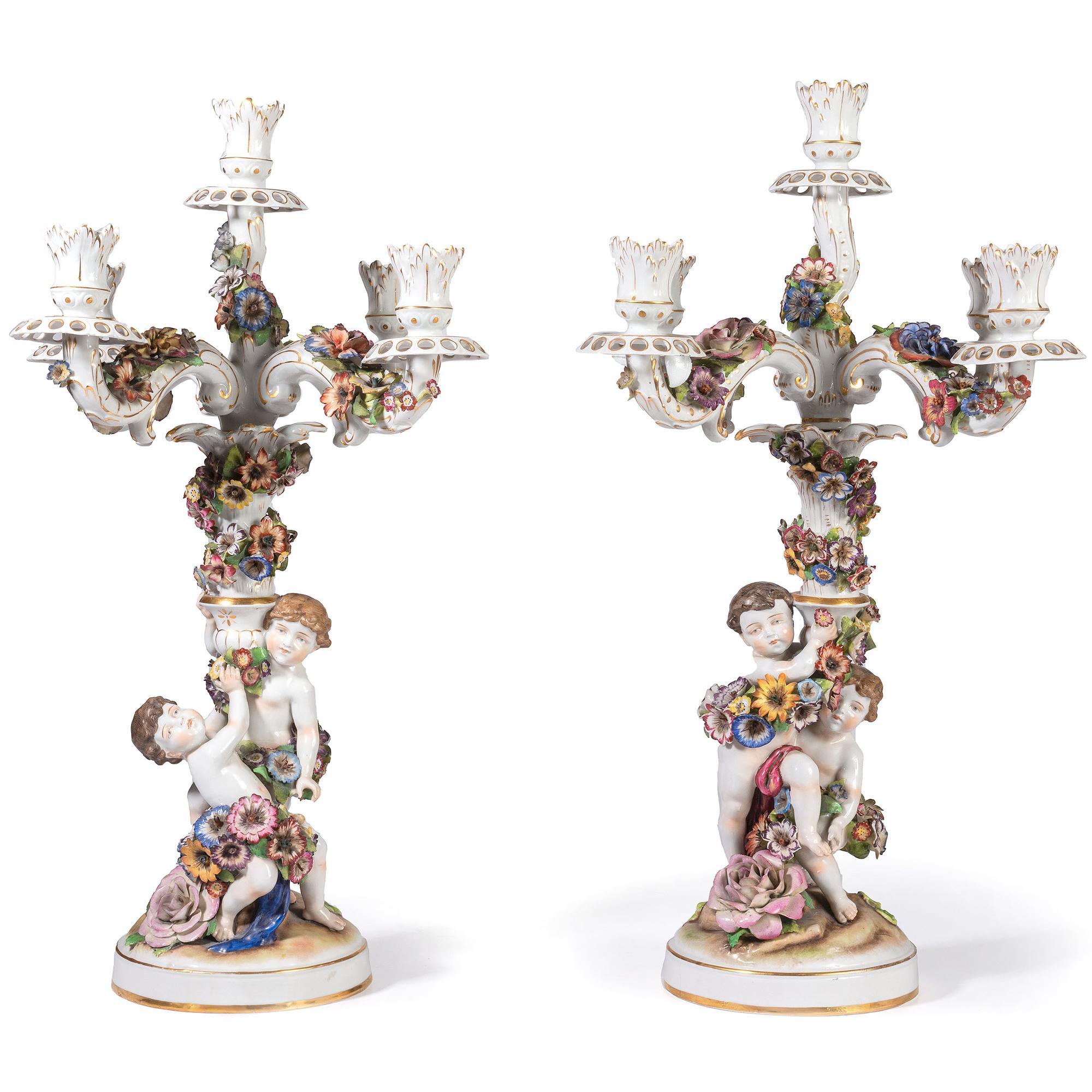 A Pair of Schierholz Porcelain Candelabra