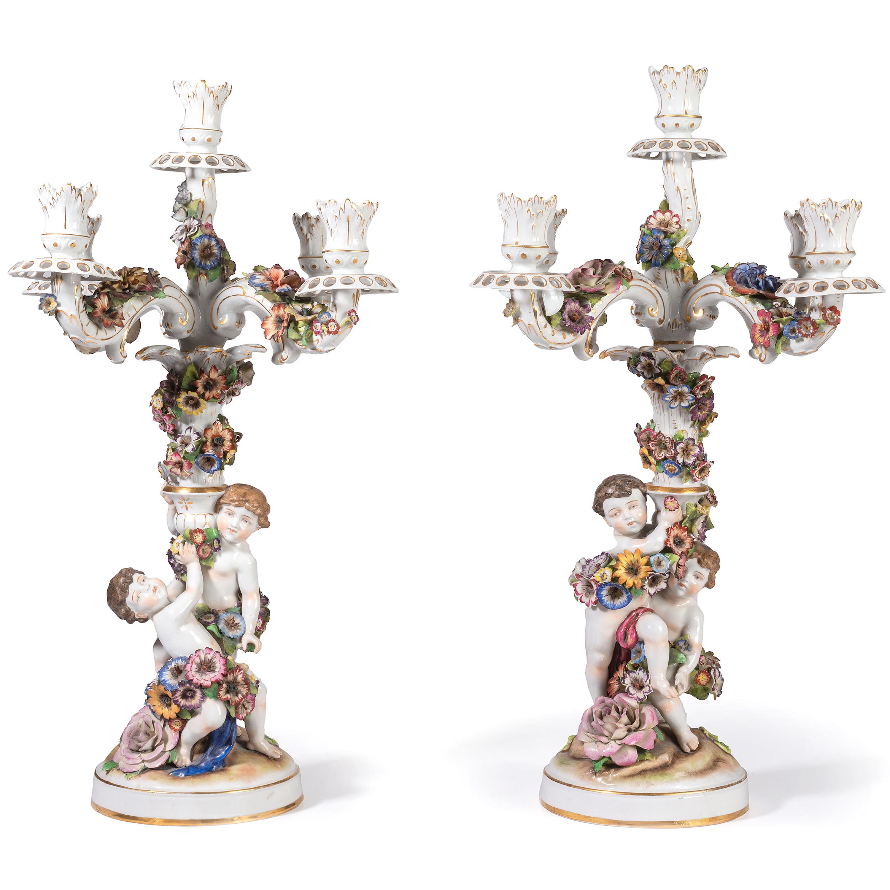 A Pair of Schierholz Porcelain Candelabra