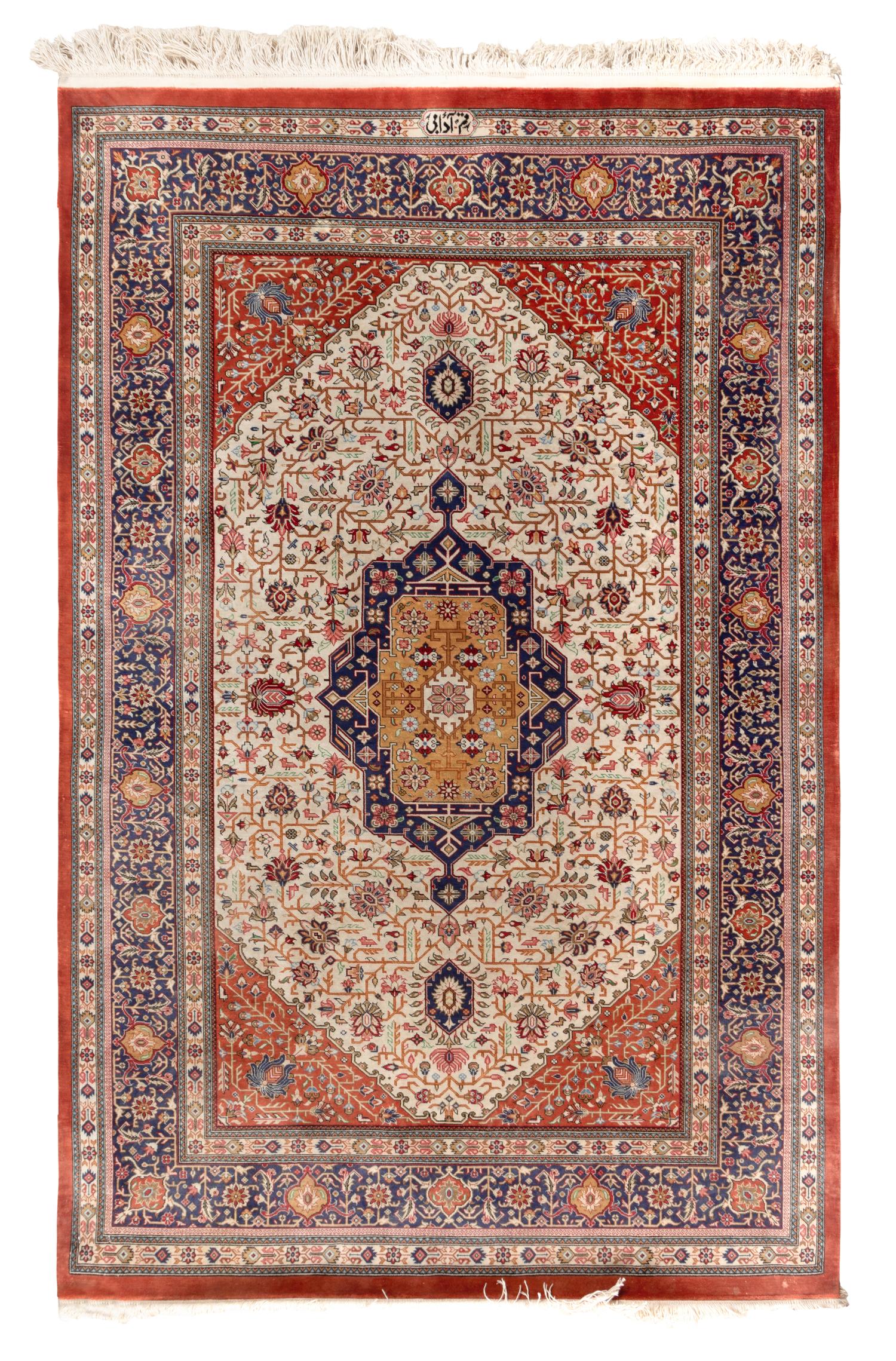 A Signed Silk Rug