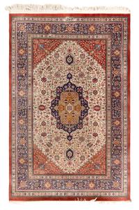 A Signed Silk Rug