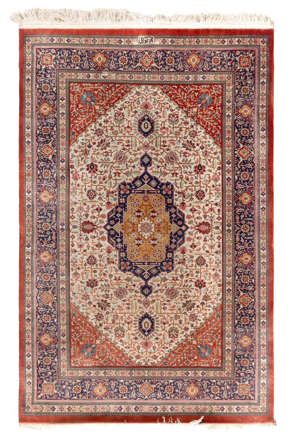 A Signed Silk Rug