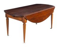 A Directoire Mahogany Drop-Leaf Dining Table