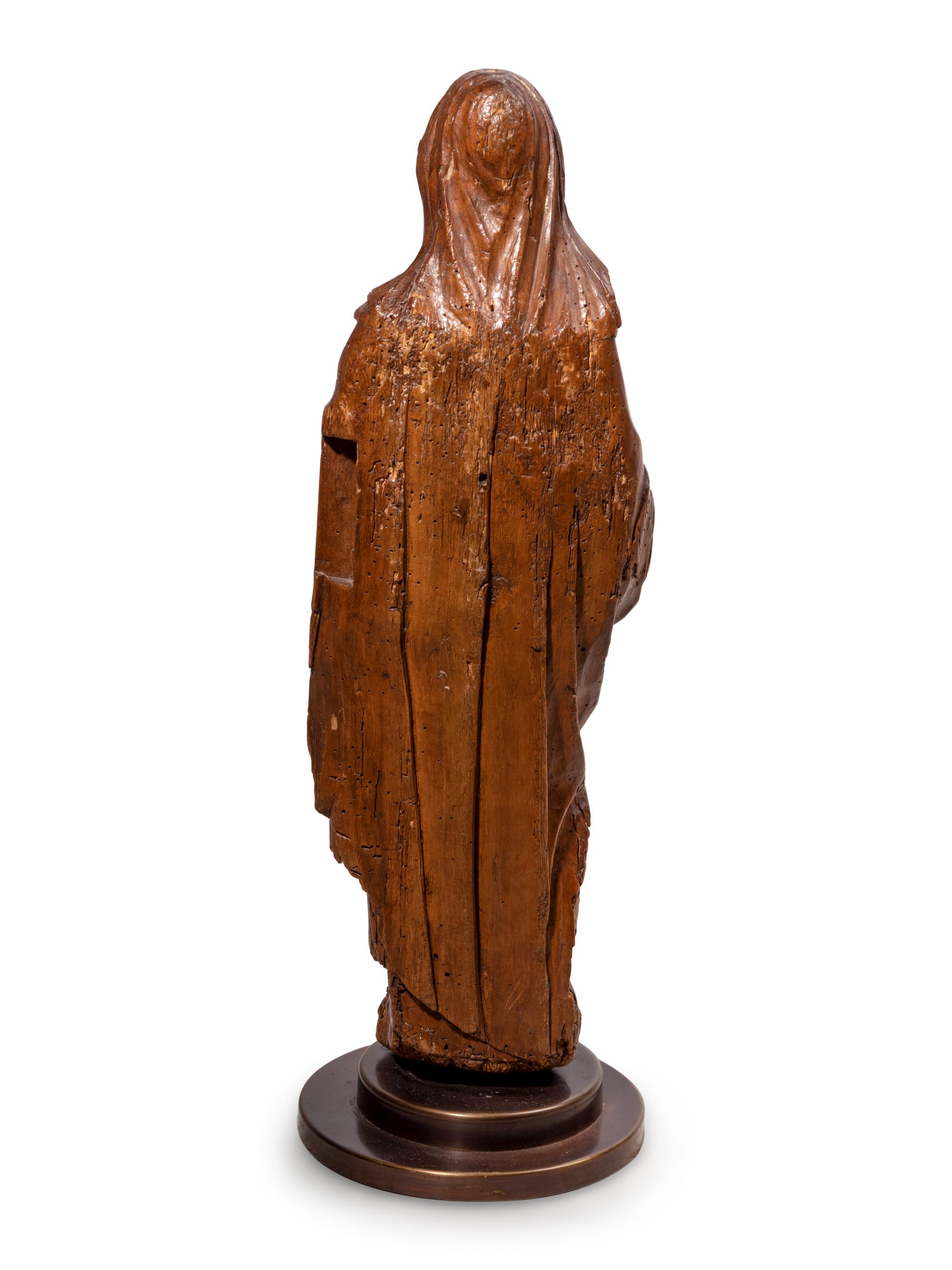 A Continental Carved Walnut Figure of the Virgin Mary