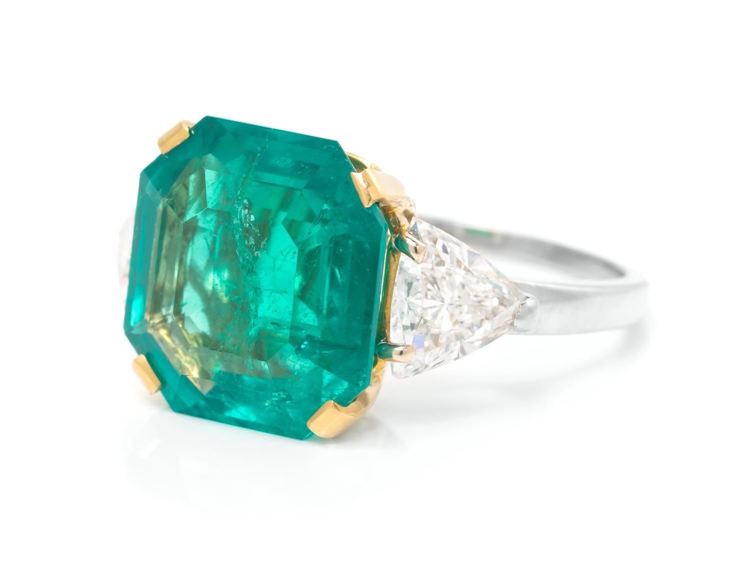 An 18 Karat Yellow Gold, Emerald and Diamond Ring, 4.70 dwts.