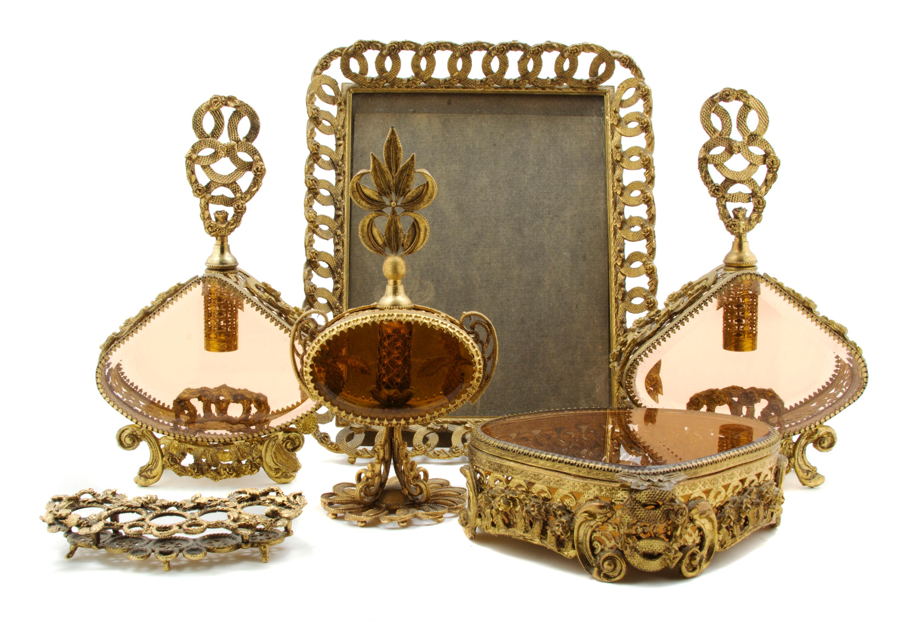 An Assembled Gilt Metal Mounted Dresser Set, Height of tallest 10 1/4 inches.